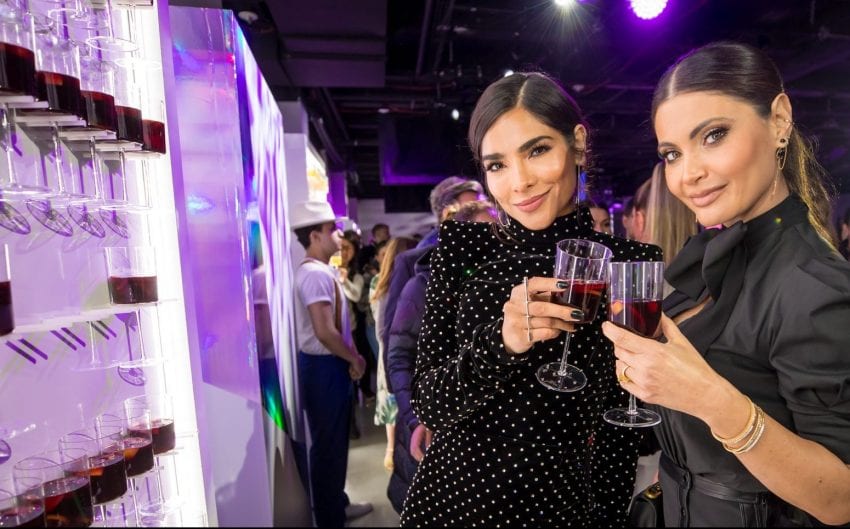 Upfront women at sangria wall