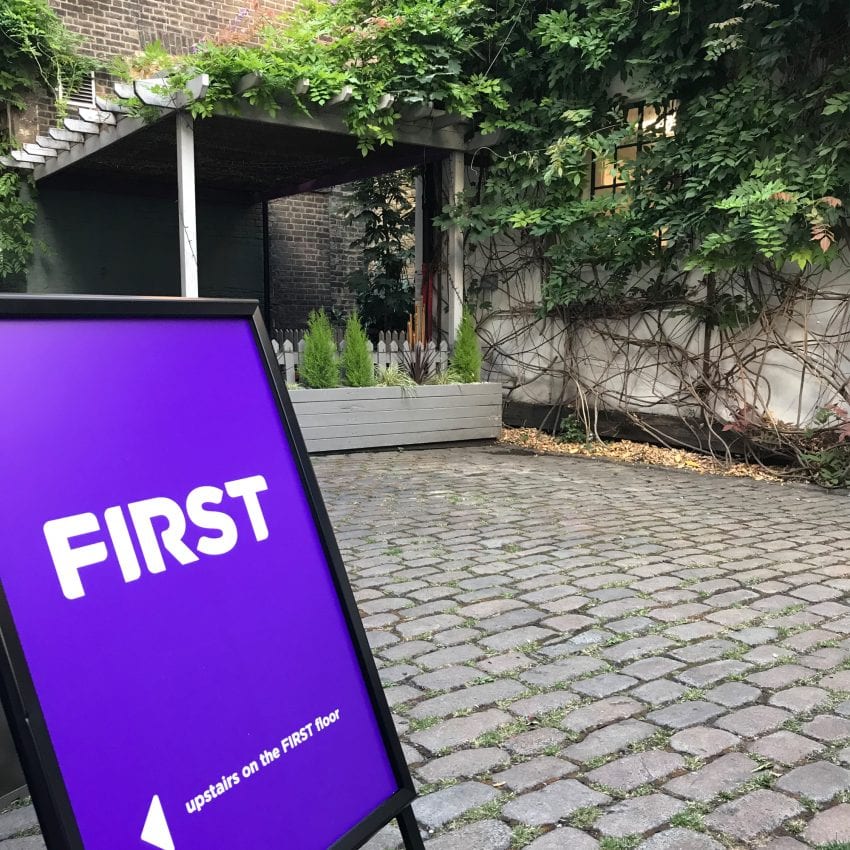 First agency directional sign outside office