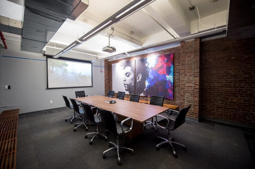 conference room with prince picture at london office