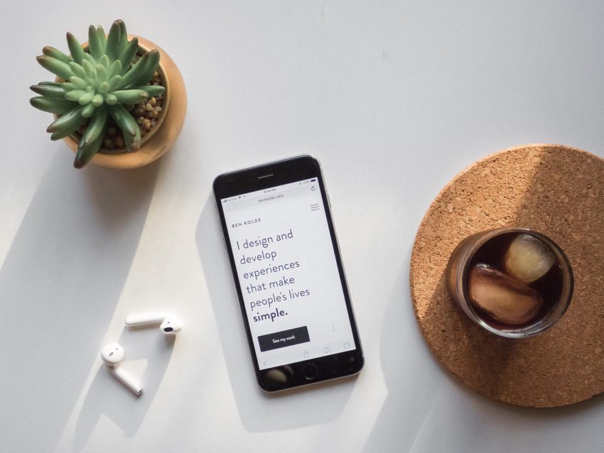 mobile phone screen on desk